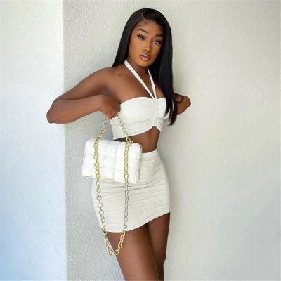 China 2021 QUICK DRY Crop Top Halter Mini Skirts Two Piece Set Summer Wear Crop Top Skirt Sets Party Skinny Clubwear for sale