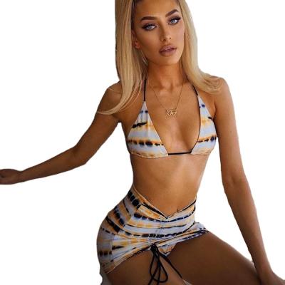 China 2021 summers printed v-neck bikini QUICK DRY thong pleated casual beach resort set wholesale three-piece skirt set for sale