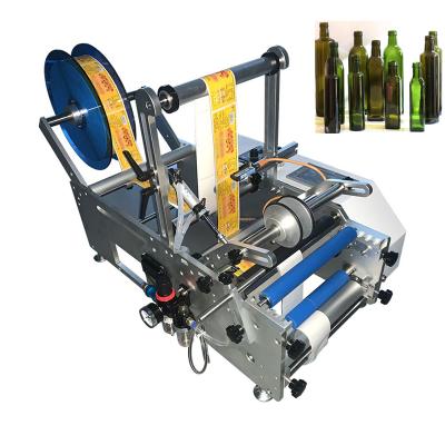 China automatic beverage flat bag labeling machine semi-automatic automatic round bottle labeling machine for sale