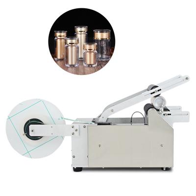 China Beverage Product Round Bottle Labeling Machine Hot Semi Automatic Bottle Labeling Machine Manual for sale