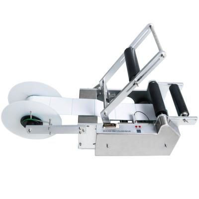 China Semi-auto Round Bottle Candy Manual Manual Beverage Hand Labeling Machine for sale