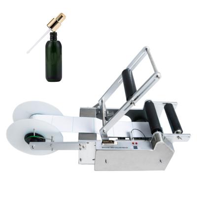 China Semi automatic beverage wholesale price round bottle labeling machine /manual labeling machine for sale