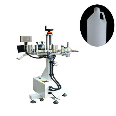 China Beverage Round Bottle Vertical Automatic Flat Head Labeling Machine for sale