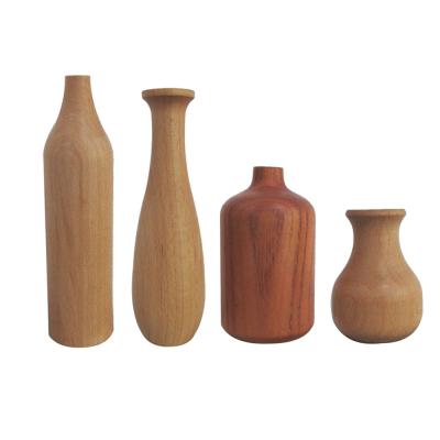 China Minimalist Traditional Hot Selling Natural Paulownia Small Wooden Vase for sale