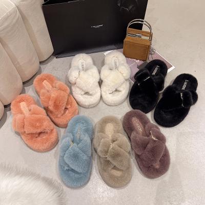 China EVA Fashionable Cozy Plush Slides Wholesale Home Indoor Faux Fur Women's Slippers Fluffy Plush Slippers for sale