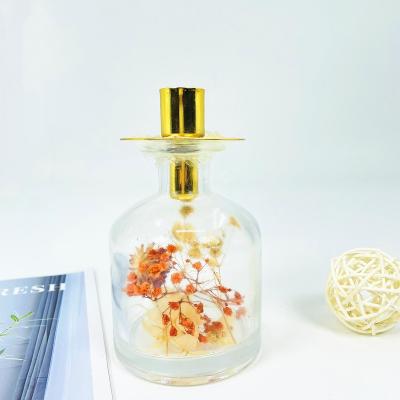 China Home decoration handmade glass candle jar with dry flower inside glass candle holder for sale