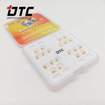 China CE Certified DTC Orthodontic Dental Roth MBT Golden Delicate Series Brackets with Hooks Machinery Power Source for sale