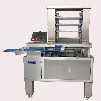 China Automatic Snack Factory Mooncake Biscuit Bread Bakery Tray Arranging Machine In Bakery Store for sale