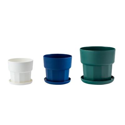 China Color Creative Nordic Minimalist Desktop Geometric Indoor Flowerpot Nursery Pots 1 Pcs Plastic Resin Macaron Potted Plants for sale