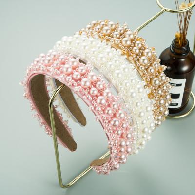 China New Fashion Handmade Gift Pink Pearl Crystal Women Headband Wide White Pearl Plain Color Hair Accessories for sale