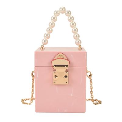 China Hot-selling leather female pearl hard clutches cosmetic bag box evening clutch PU casual shoulder bag for sale