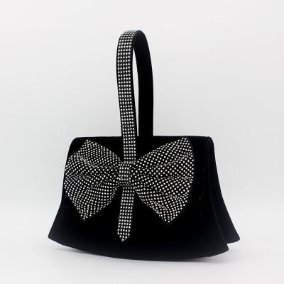 China Hard Simple Style Velvet Dazzle Bowknot Elegant Contracted Shiny Beads Handle Women Clutch Bag for sale