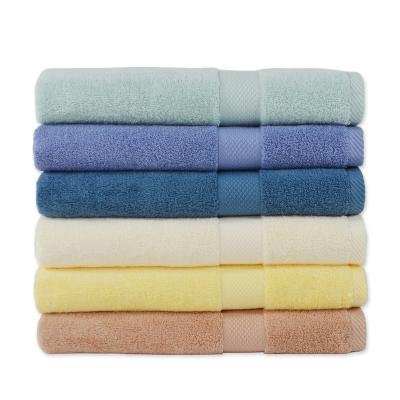 China Custom Sustainable Logo Staple 6 Cotton Solid Color 70cm 140cm Long Bath Towel for sale