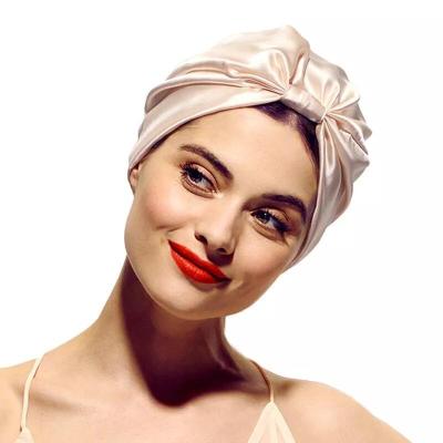 China Sleep hat for women hair plain comfortable chic elastic silk satin turban multicolor knotted sleep hat for women head cover for sale