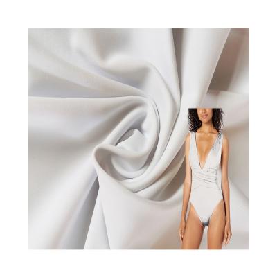 China Stretch Fabric Stretch Reclaimed Polyest Spandex Quick Dry Recycled Breathable Fabric For Swimsuit for sale