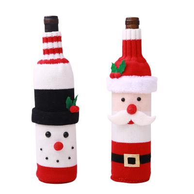 China Cute Handmade Knitted Party Decorations Christmas Sweater Knitted Snowman Santa Claus Wine Bottle Cover for sale