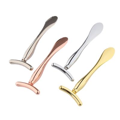 China Dual-Use T-Shaped Zinc Alloy Spoon Dual-Use Zinc Alloy Cream Scoop Roller Eye Mask Scoop Roller Anti-Wrinkle Eye Cream Massage Stick for sale