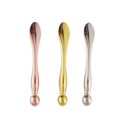 China Hot Sale Zinc Alloy Drop Shaped Spoon Face Eye Cream Roller Scoop Roller Anti Wrinkle Eye Cream Applicator Massage Stick Facial Cream for sale