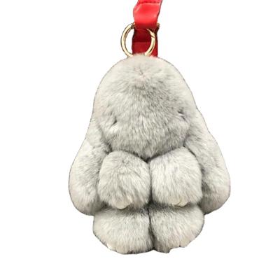 China Wholesale High Quality Real Rex Rabbit Fur Charm Bag Mobile Phone Bag Car Accessories Key Chain Pendant for sale