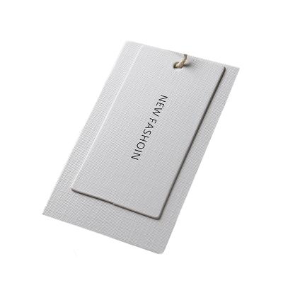 China Recyled Custom Logo Label Paper Clothing Tags For Clothes for sale