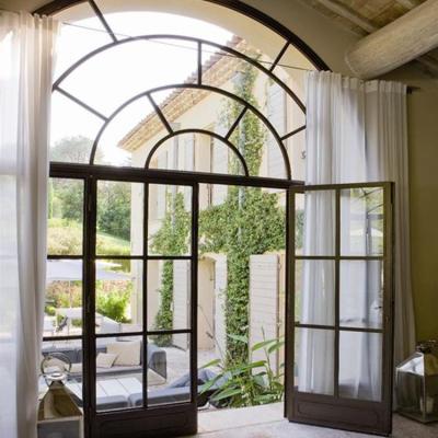 China Modern Cheap Arch Half Moon Curved Aluminum Sliding Glass House Door for sale