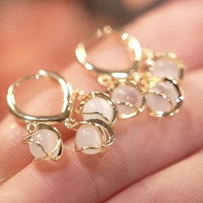 China Single earring studs Korean high-end fresh simple soft temperament Cat Eye Jewelry Pendant Earrings vintage small for sale