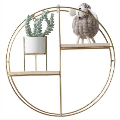 China Sustainable Factory INS Hanging Wall Metal Golden Rack With Wooden Board Shelf for sale