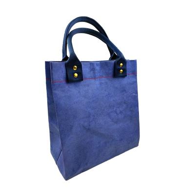 China Gift & New Design Craft Women Gift Shoulder Handbag Washable Kraft Paper Shopping Bags With Handle for sale