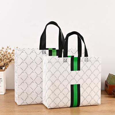 China Handled Wholesale promotional Low MOQ ready to ship fashion lamination PP non woven bag shopping tote bag carry bag for sale