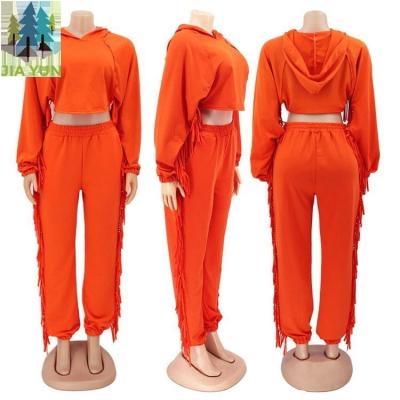 China Fashion custom solid color fall hot selling tassel sweatsuit equipment thick nylon/cotton hood set women NG suit for sale