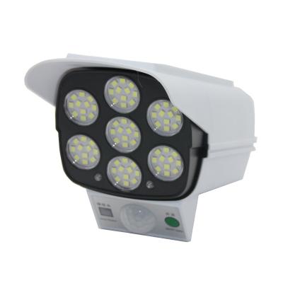 China Outdoor Led Wall Garden Yard Solar Light White Light Simulation Monitoring Solar Wall Light for sale