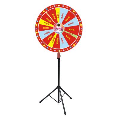 China Easy Installation Iron Frame Standing Adjustable Tripod Rotating Wheel Professional Fortune Display Racks For Activity Game for sale