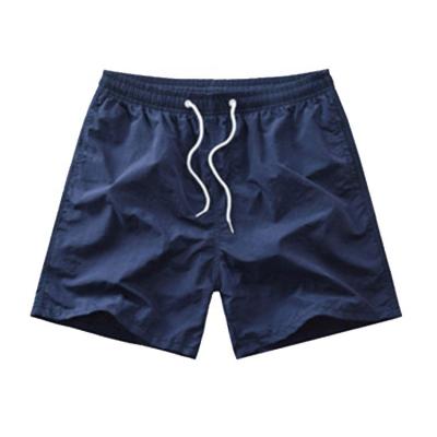 China Custom Men's Summer Beach Vacation Loose Drawstring Casual Breathable Elastic Waist Boys Boys Shorts Plain Shorts for sale