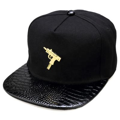 China COMMON Wholesale Cheap Metal Plate 5 Panel Hat Custom Snapback Hat for sale