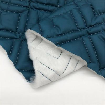 China Waterproof TAFFETA FABRIC QUILTED WITH NON WOVEN FABRIC USE FOR LINING for sale