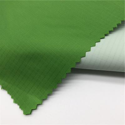 China Waterproof 100% POLYESTER 210T RIBSTOP TAFFETA WITH MILKY PU COATED FABRIC for sale