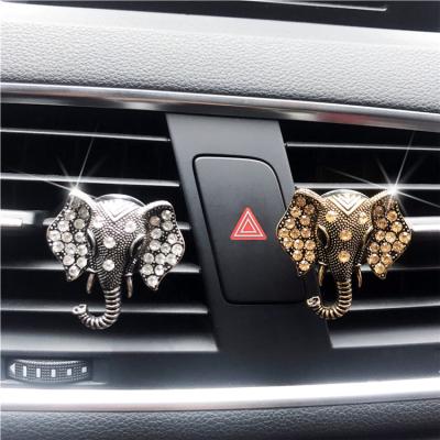 China Cute Diamond Crystal Elephant Head Car Perfume Fruit Fragrance Diffuser Clip Freshener Eco-friendly Car Freshener for sale