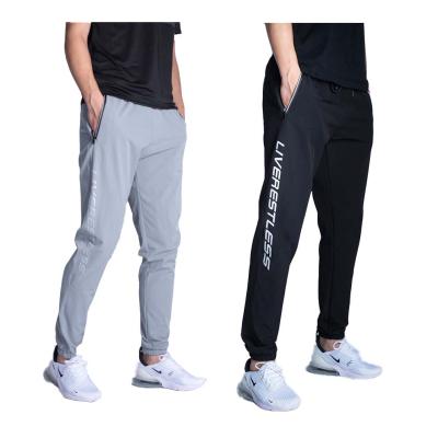 China 10701-SE29 Men's Clothing Joggers Nylon Sweat Letter Print Mens Pants And Trousers Breathable Sehe Fashion for sale