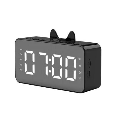 China 2021 New Function Phone Small Clock Wireless Speaker With LED Alarm Clock Speaker Clock Outdoor Portable Card Audio Radio for sale