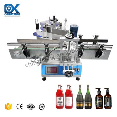 China Small Food Sticker Labeling Machine For Round Bottle PVC Label Mini Portable Dispensing Dispenser for sale