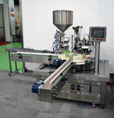 China Guangzhou CX Hot Sale Automatic Rotary Medicinal Food Liquid Filling Capping Machine For Production Line for sale