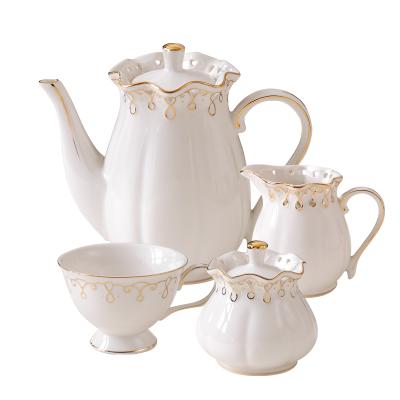 China Sustainable Wholesale Custom White Bone China Embossing Teapot With Cup Bone China Ceramic Dinnerware Sets for sale