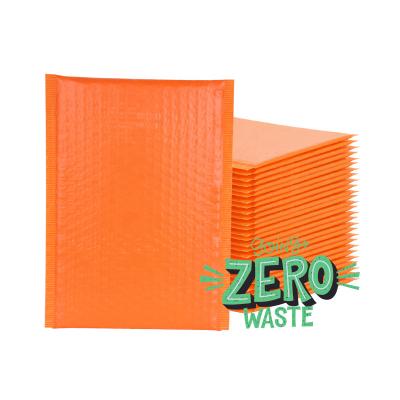 China Large Strong Adhesive Compostable Bulk Shipping Bags Orange Bubble Mailer Bags With Logo for sale