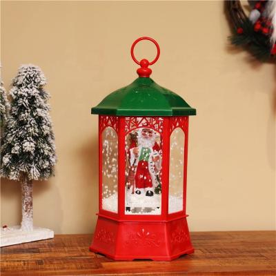 China Christmas plastic lantern with music snow lantern for christmas musical lamp with snow and light for sale