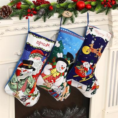 China New Design Nonwoven Christmas Stocking Stuffers Nonwoven Santa Gift Bag Candy Stocking Reindeer Gift Stocking for sale