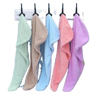 China Wholesale QUICK DRY Wrap Super Absorbent Soft Microfiber Hair Spa Drying Hair Colored Black Hair Towels With Buttons for sale