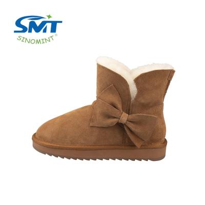 China New Beautiful Bow Tie Trend Fashion Winter Warm Hairy Leather Girls Durable Snow Boots for sale