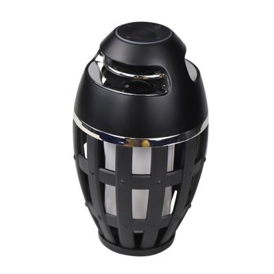 China Visual romantic waterproof night flame simulation speaker gaming radio lamp barbecue outdoor camping lightweight led wireless speaker for sale