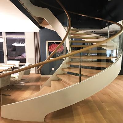 China Modern wooden tread curved decorated staircase with steel plates for sale