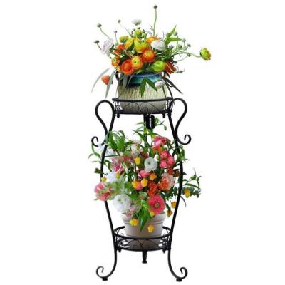 China Idyllic Creative Multilayer Indoor Wrought Iron Flower Rack Floor Plant Stand for sale